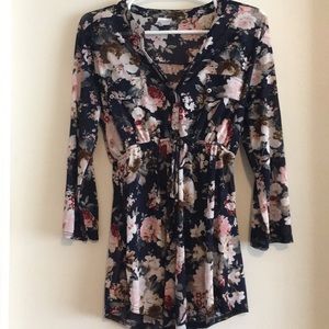 Sheer floral maternity top.
